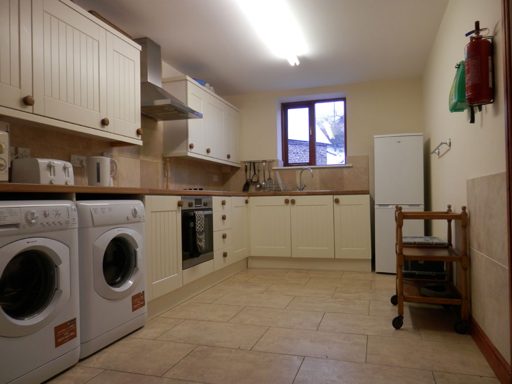 Kitchen with laundry appliances
